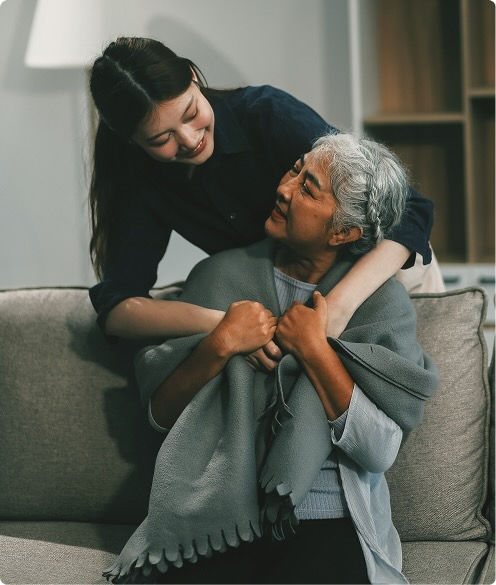 a daughter hugging her mother