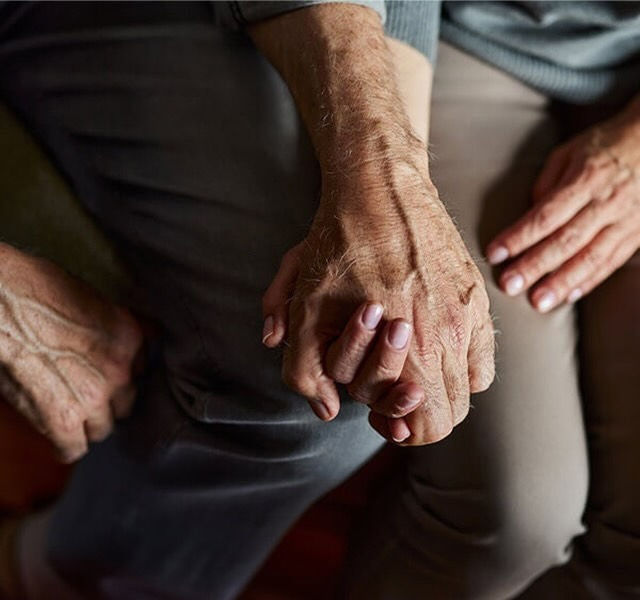two people holding hands