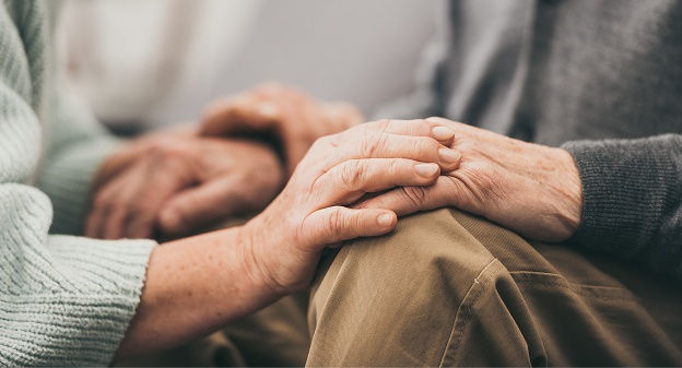 two people holding hands